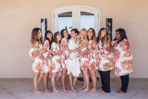 bridesmaids in robes at the edwards estate in bakersfield ca