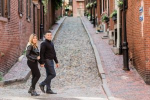 walking across acorn street in boston