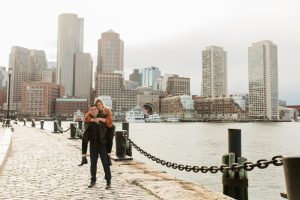 engagement session in seaport boston, piggyback ride