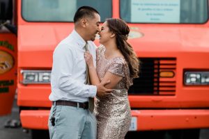 just married couple in front of a taco truck